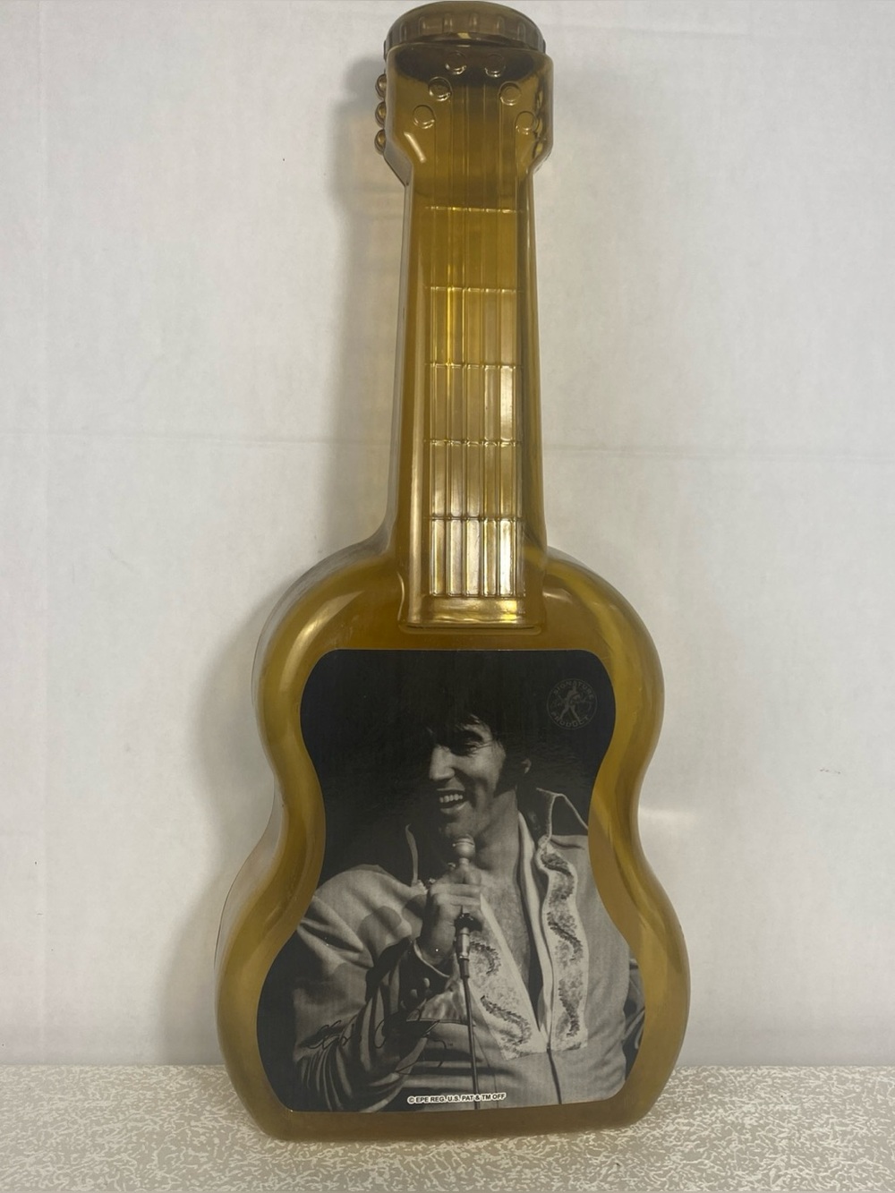 Vintage Elvis Presley Guitar Bank Coin Amber Plastic Snack Factory